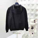 Side profile of Louis Vuitton luxury clothing with signature branding