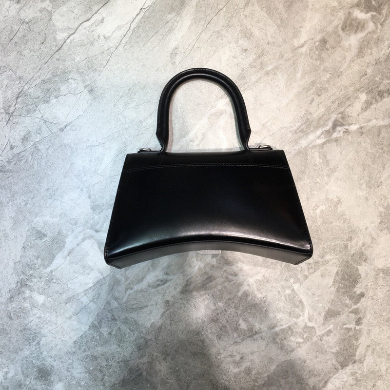 Sleek Faux Leather Handbag - Statement Silhouette | Women's Premium Handbag #630 - back view (image 4) of designer-inspired handbag