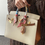 Poised bag shown from front angle