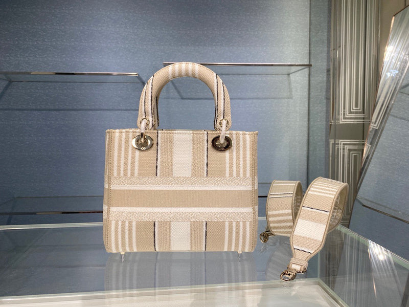 Handle and strap detail of signature chic women's handbag – women's designer-style accessory