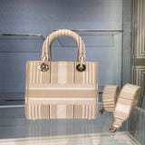 Handle and strap detail of signature chic women's handbag – women's designer-style accessory