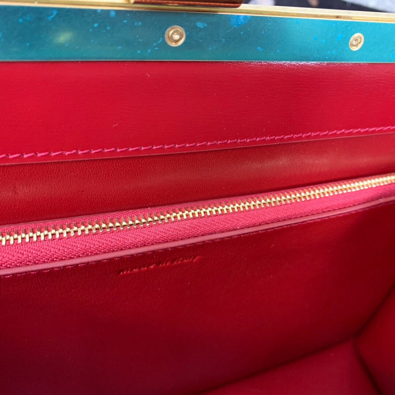 Front view of chic sleek women's handbag – women's luxury accessory