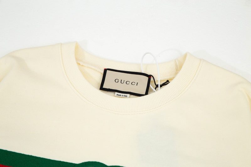 Close-up detail shot of Gucci luxury clothing with contemporary cut