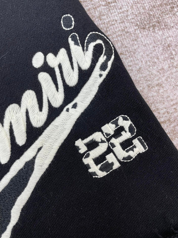 Texture and finish detail of Amiri luxury piece style No.098