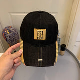 Angled view of Burberry unisex cap