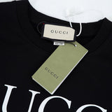 Flat lay presentation of Gucci luxury clothing with everyday silhouette
