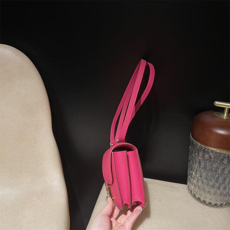 Side view of clean-lined structured handbag