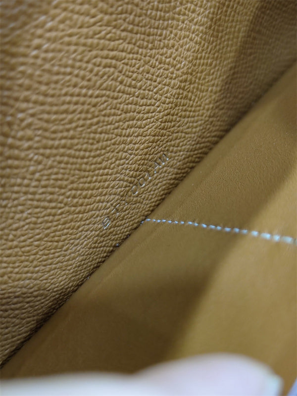 Side view of refined structured handbag