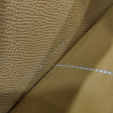 Side view of refined structured handbag