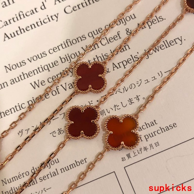 Lifestyle view of Van Cleef & Arpels unisex jewelry piece
