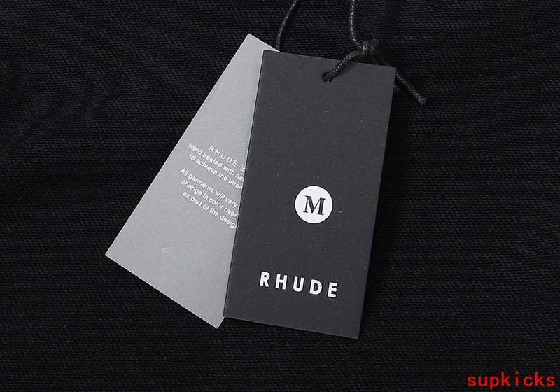 Side profile of Rhude luxury clothing with signature branding