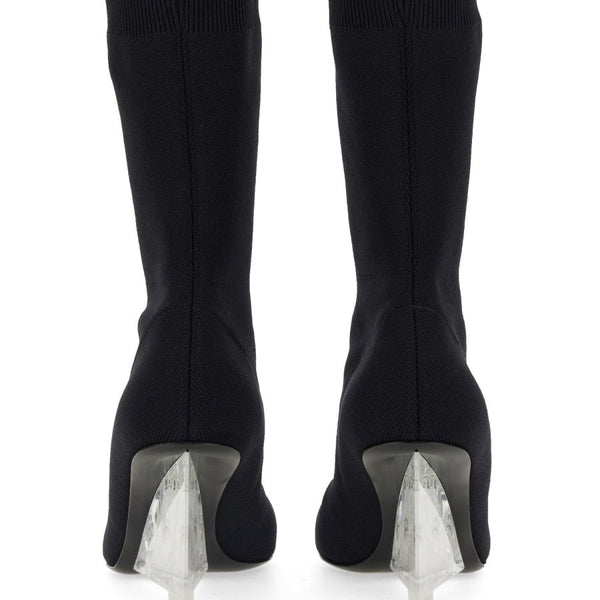 Close-up of Alexander McQueen boots & booties hardware and fine stitching