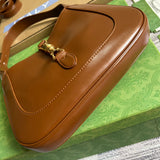 Back view of polished sleek women's handbag – women's designer-style accessory