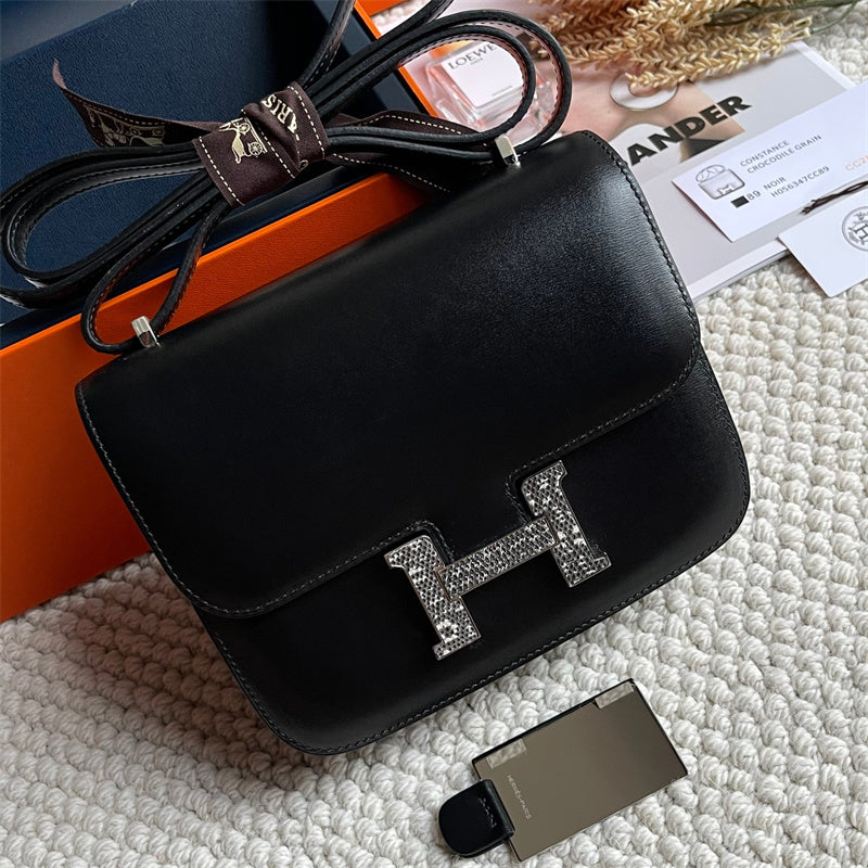 Side view of streamlined structured handbag