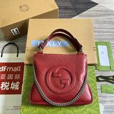 Front view of sleek statement women's handbag – women's luxury handbag