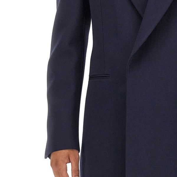 Close-up of Alexander McQueen coats hardware and fine stitching