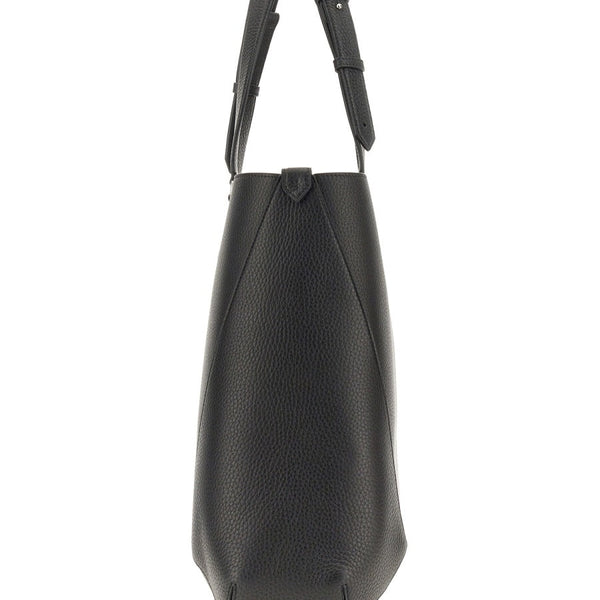 Alexander McQueen cross body bags lifestyle shot premium designer piece