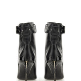Alexander McQueen boots & booties lifestyle shot premium designer piece