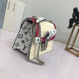 Close-up detail of refined signature women's handbag – women's luxury handbag