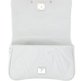 Close-up of Alexander McQueen cross body bags hardware and fine stitching