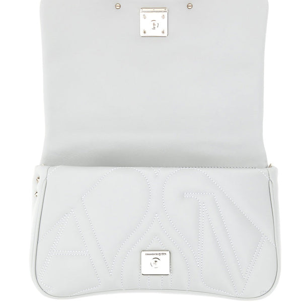 Close-up of Alexander McQueen cross body bags hardware and fine stitching