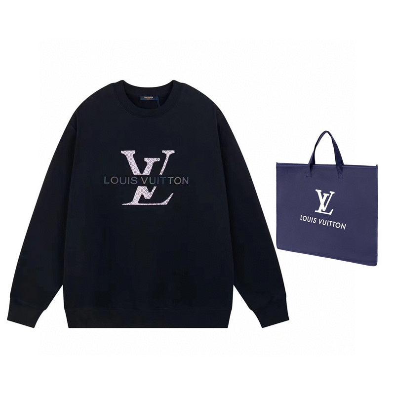 Close-up detail shot of Louis Vuitton luxury clothing with signature branding