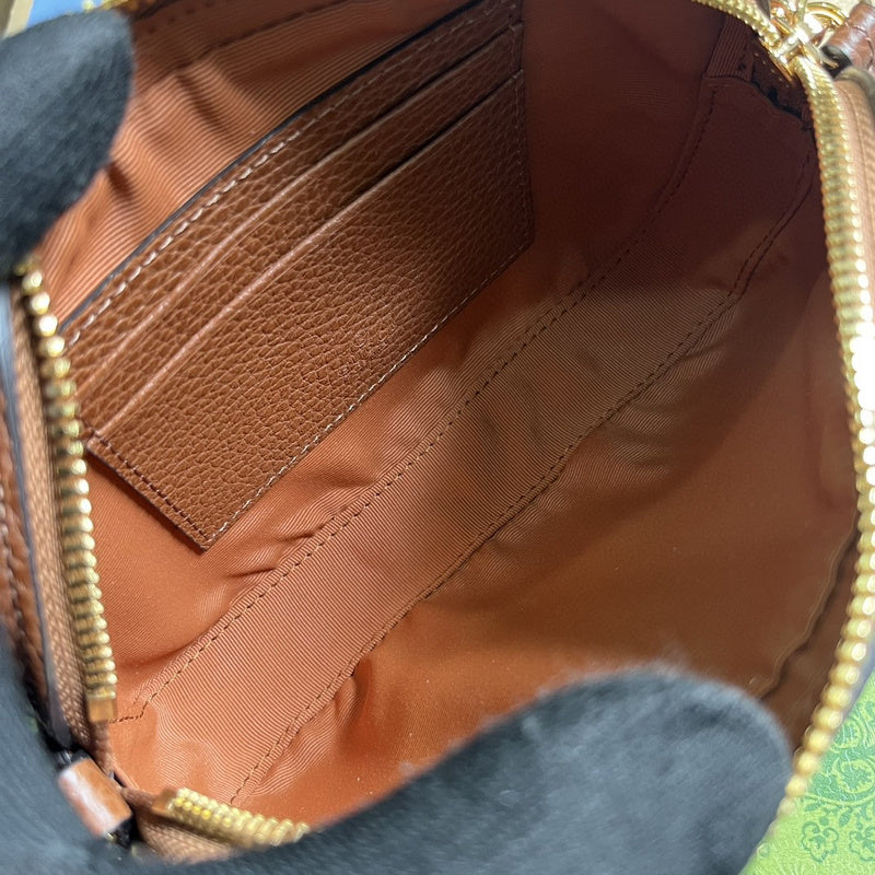 Close-up detail of polished structured women's handbag – women's statement bag