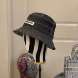 Close-up detail view of Burberry unisex cap