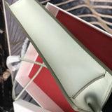 Front view of refined sleek women's handbag – women's everyday handbag