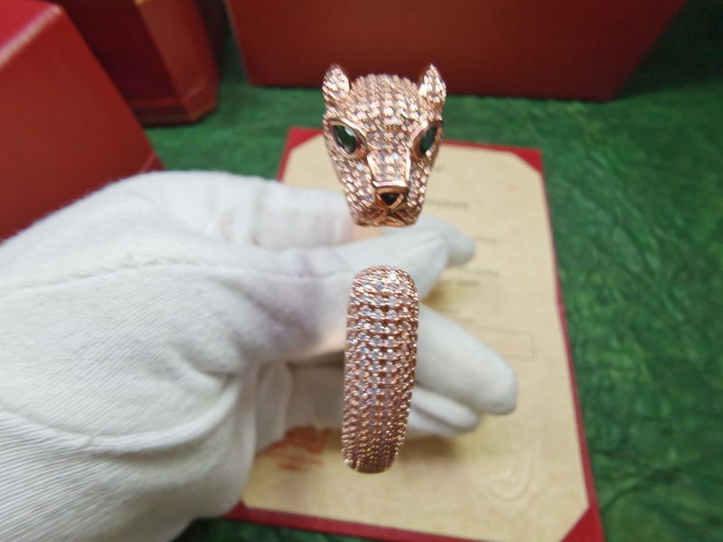 Angled view of Cartier unisex jewelry piece