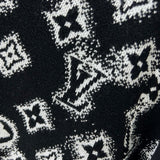 Flat lay presentation of Louis Vuitton luxury clothing with logo-detail design