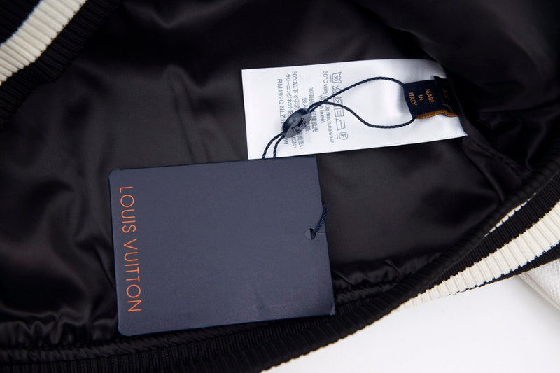 Close-up detail shot of Louis Vuitton luxury clothing with contemporary cut