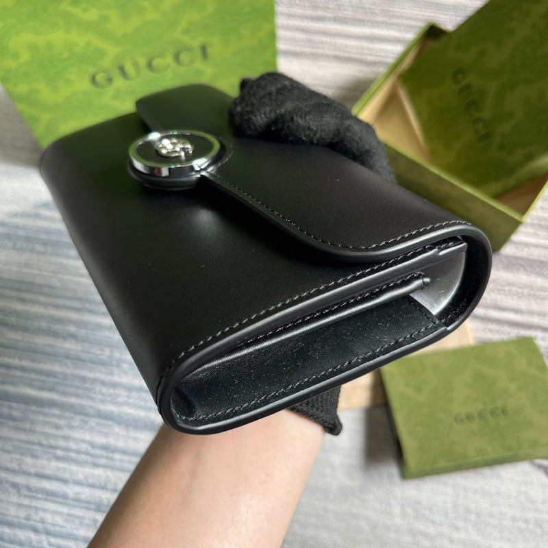 Back view of everyday-luxe sleek women's handbag – women's statement bag