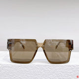 Close-up detail view of Louis Vuitton unisex sunglasses