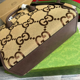 Styled lifestyle shot of signature statement women's handbag – women's luxury handbag