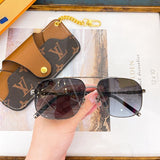 Side view of Louis Vuitton unisex sunglasses
