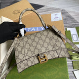 Back view of structured classic women's handbag – women's luxury accessory