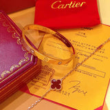 Side view of Cartier unisex jewelry piece