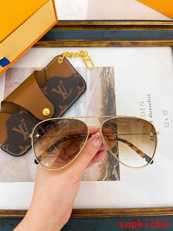 Lifestyle view of Louis Vuitton unisex sunglasses