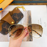 Lifestyle view of Louis Vuitton unisex sunglasses