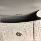 Side profile of signature chic women's handbag – women's luxury accessory