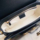 Handle and strap detail of everyday-luxe classic women's handbag – women's everyday handbag
