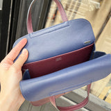  timeless top-handle bag detail view showing craftsmanship 8