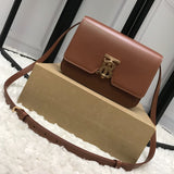 Ziva's Charm handbag – side angle view (one versatile size)