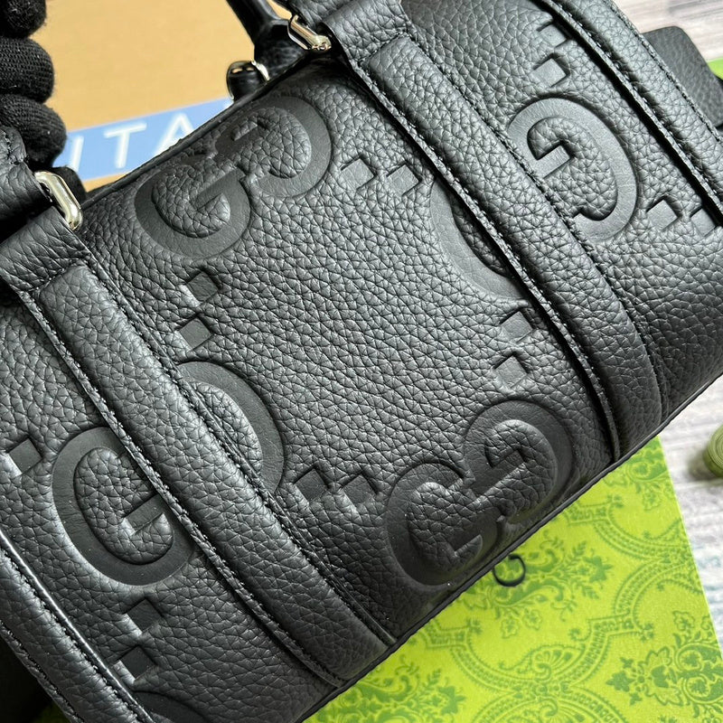 Back view of polished structured women's handbag – women's statement bag