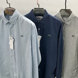 Close-up detail shot of Lacoste luxury clothing with logo-detail design