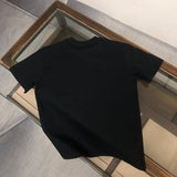 Close-up detail shot of Givenchy luxury clothing with relaxed-fit cut