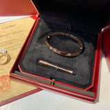 Close-up detail view of Cartier unisex jewelry piece