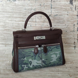 Side view of elegant structured handbag