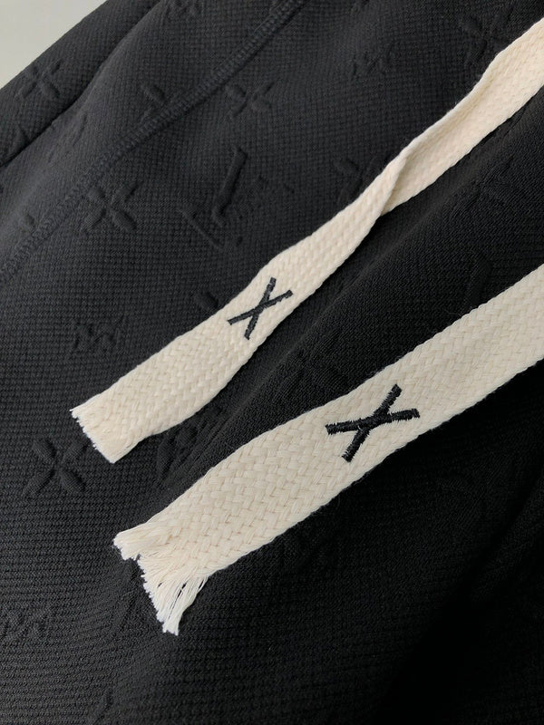Close-up detail shot of Louis Vuitton luxury clothing with tailored silhouette